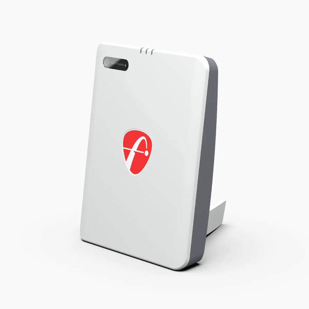 Side view of the FlightScope Mevo Plus launch monitor on a white background, showing its sleek white design with a red logo.